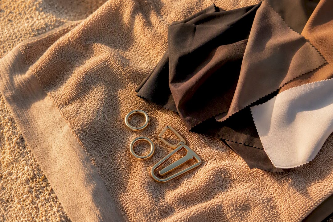 Swimwear fabric swatches and hardware details