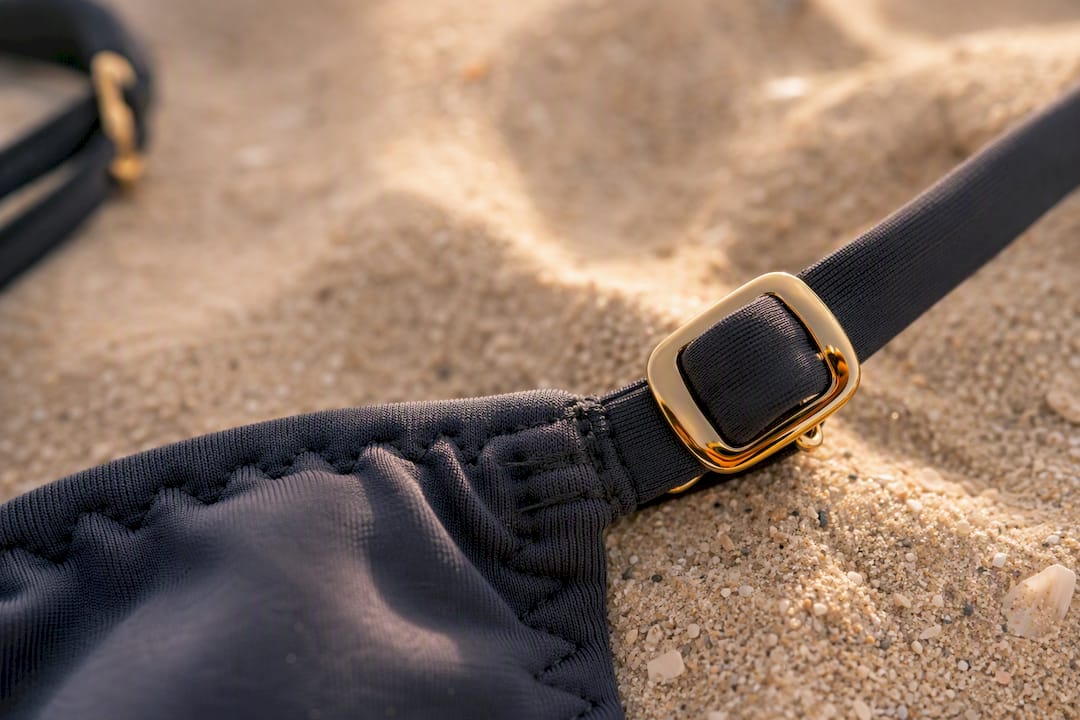 Close-up of swimwear adjustable strap hardware