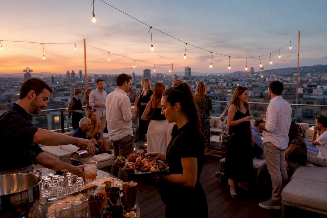 Hands preparing drinks on Barcelona rooftop terrace
