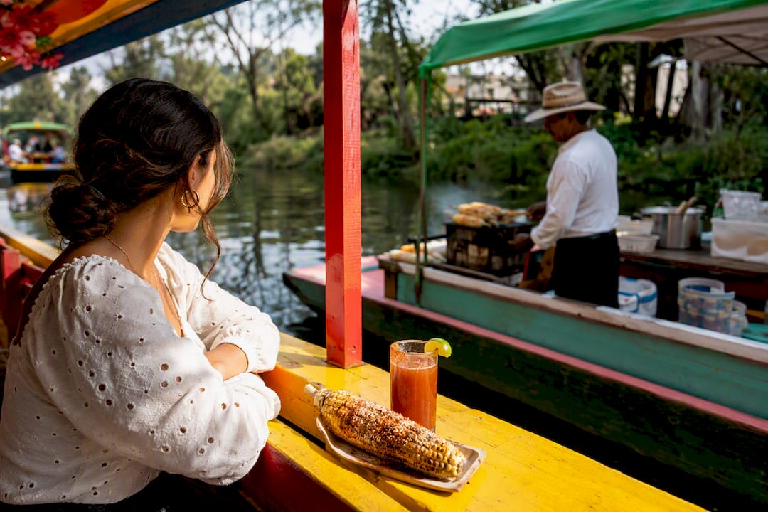 Street food boats along a Xochimilco canal