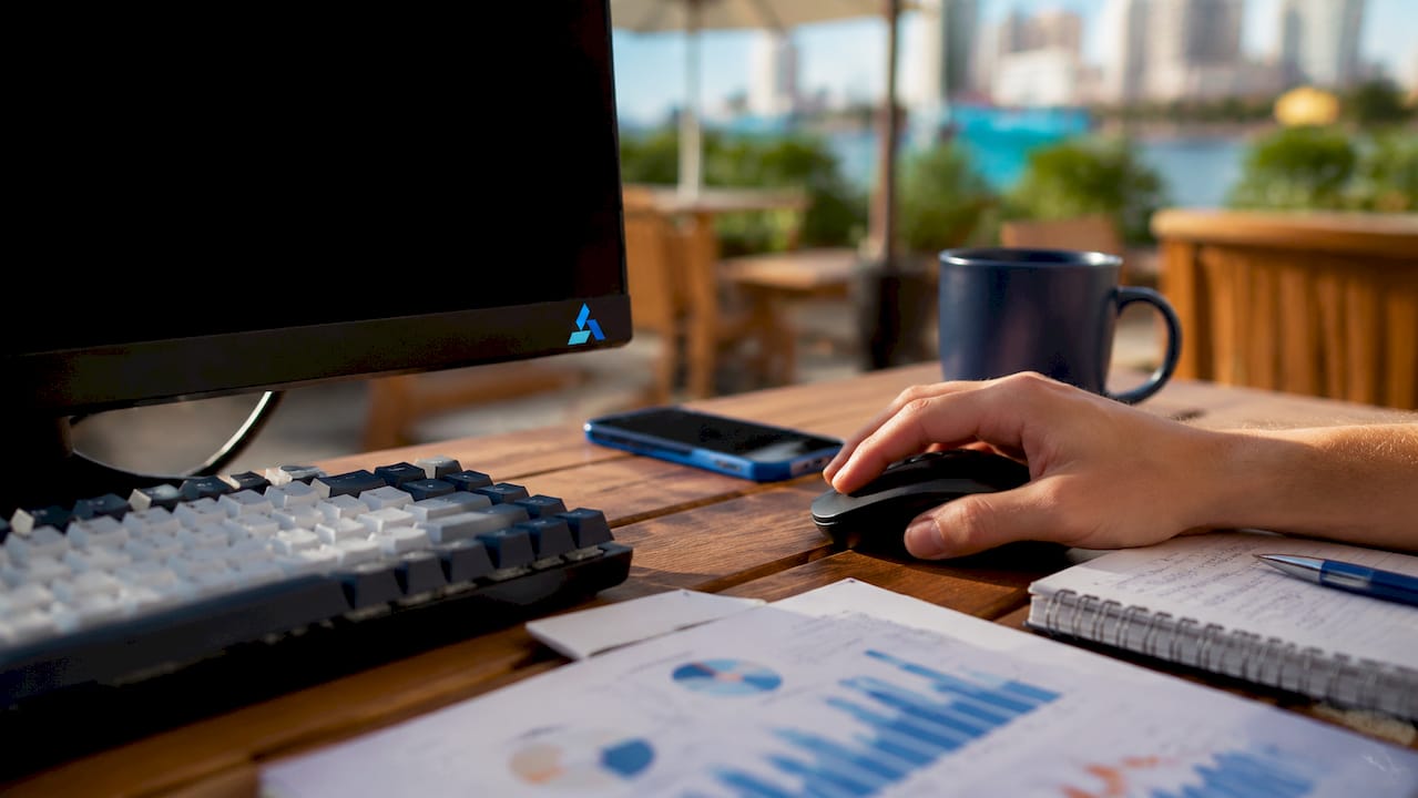 Close-up of analytics workspace with Blue Prysm branded items