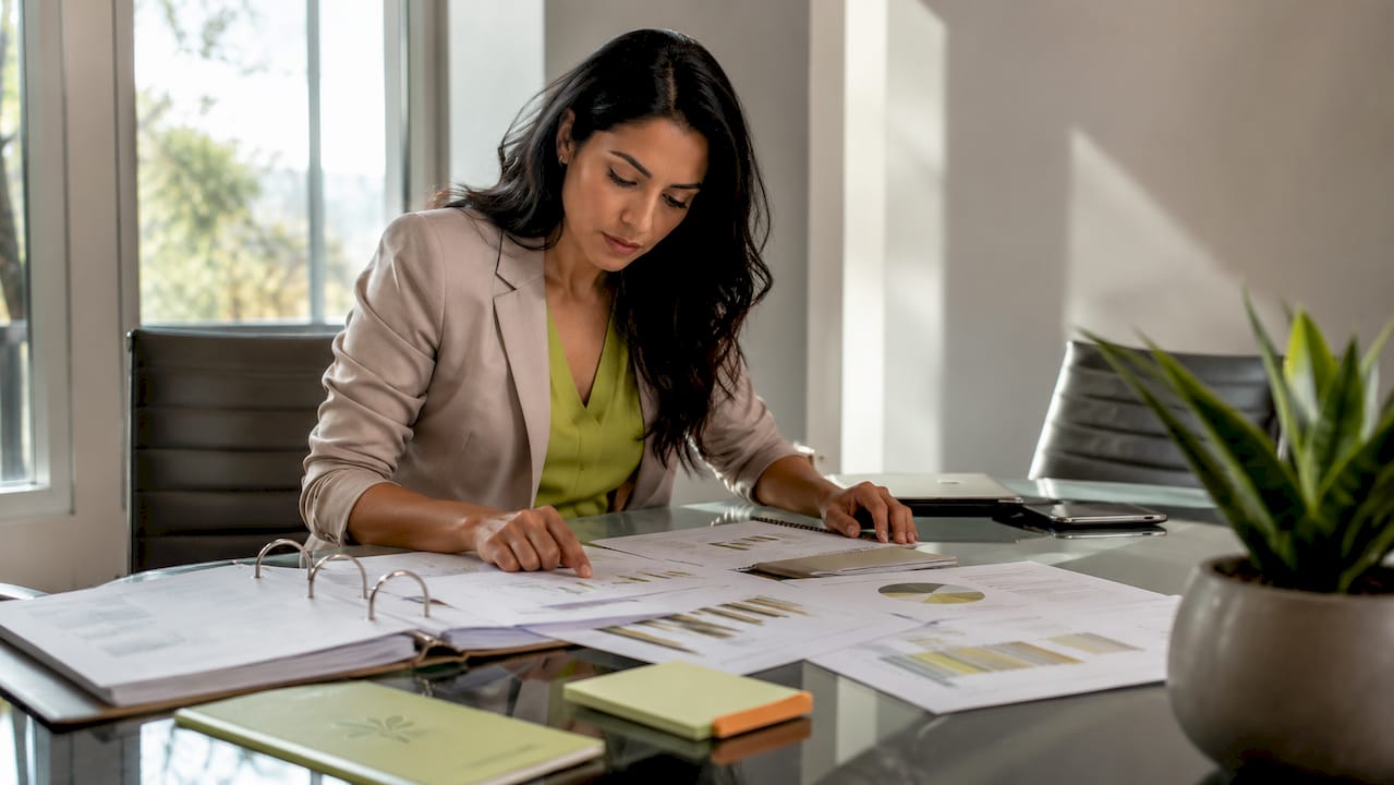 Female HR leader reviewing wellness ROI reports