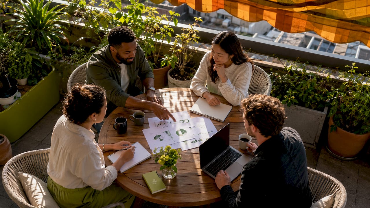 Diverse team collaborating around conference table
