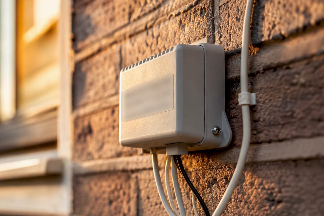 Doorbell transformer mounted on wall