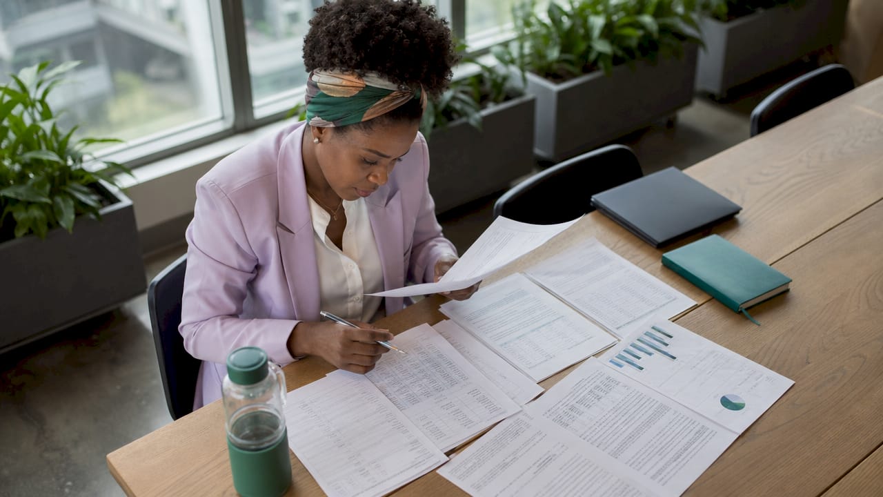 Financial analyst reviewing digital asset governance documents