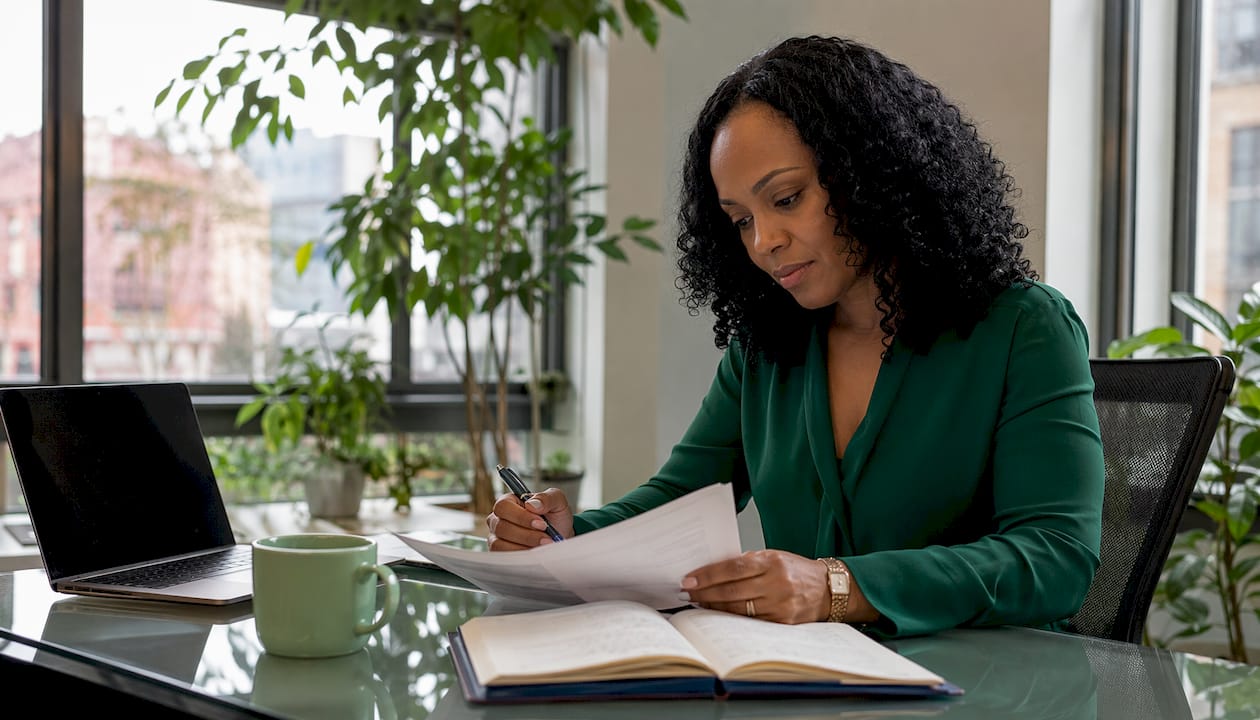 Financial analyst reviewing digital asset documents