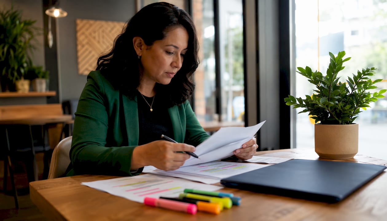 Woman reviewing digital asset licensing documents