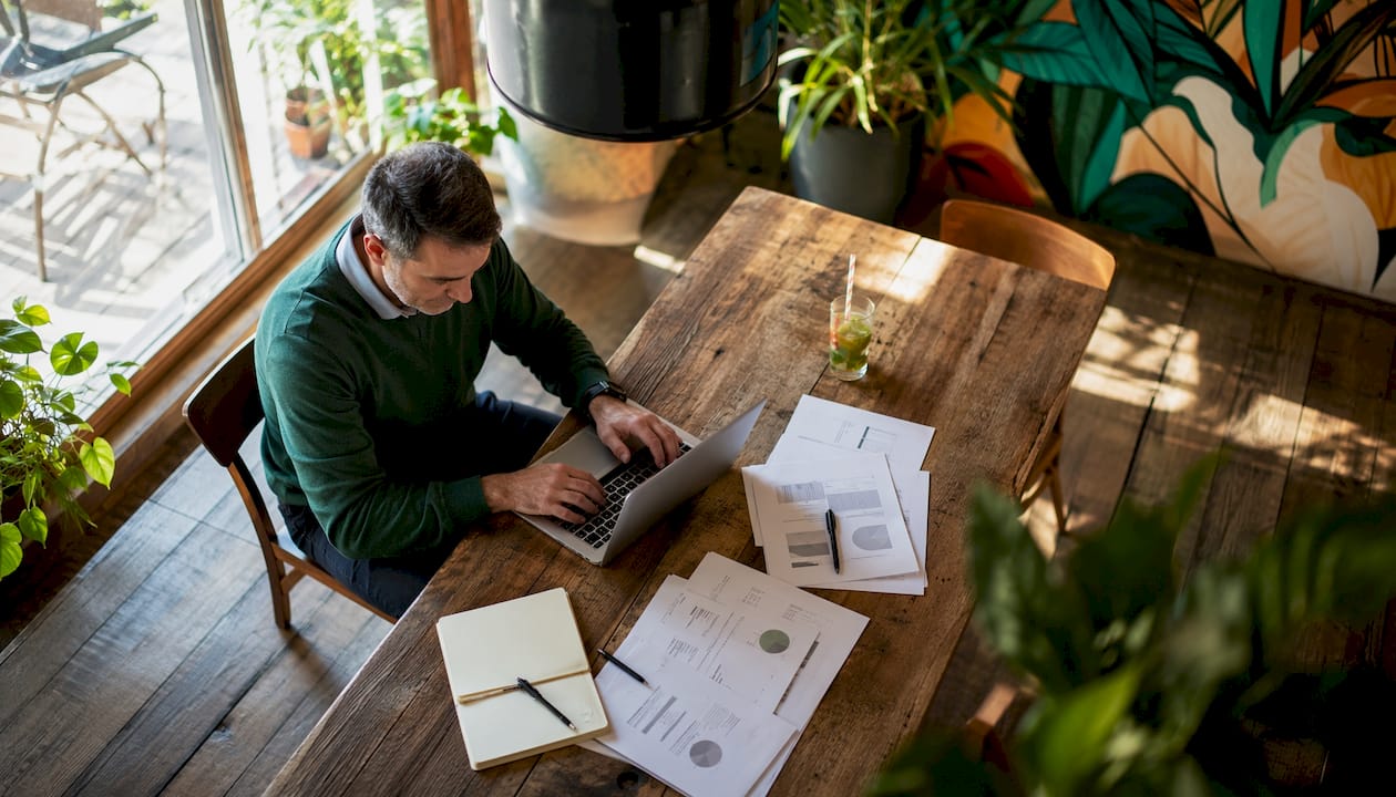 Over-shoulder view of analyst designing crypto test scenarios