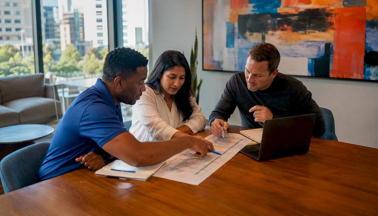 Team reviewing cleaning scope of work