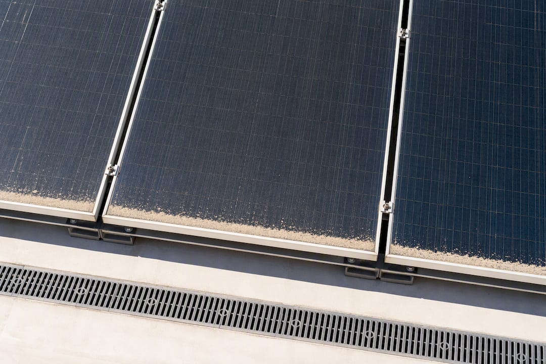Residue collected along solar panel edges