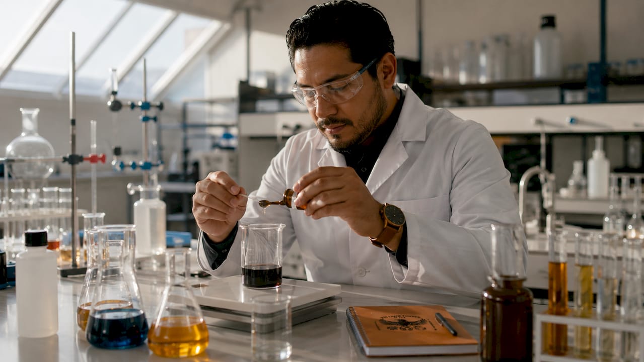 Scientist analyzing coffee acids in lab