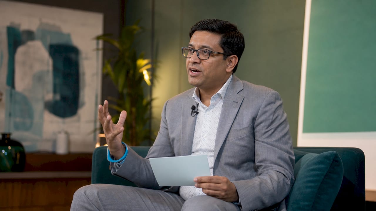 Male media spokesperson delivering a live TV interview