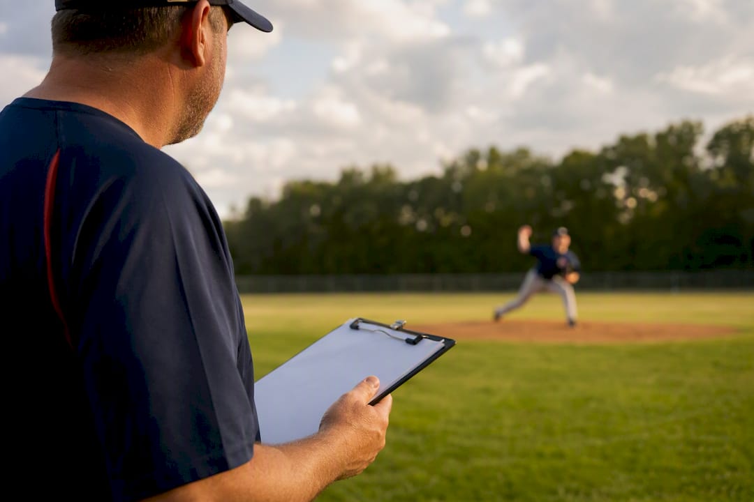 Coach timing and tracking youth pitcher throws