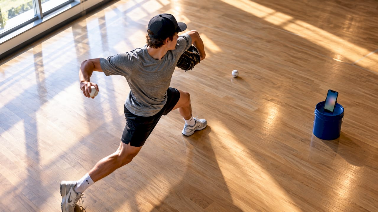 Youth pitcher recording flat-ground drill