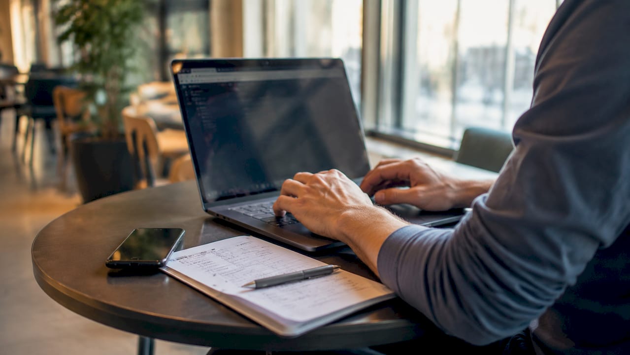 A developer configures 301 redirects with status code on their laptop.