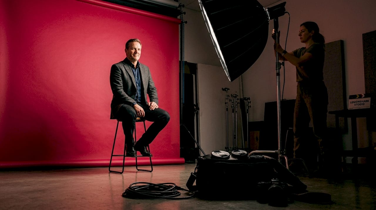 Man in studio during corporate headshot shoot
