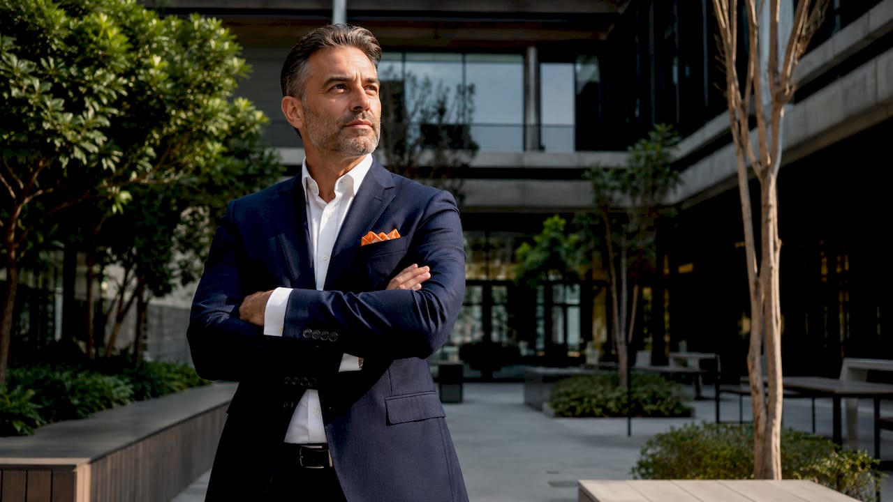 Entrepreneur posing in photography studio for brand portrait