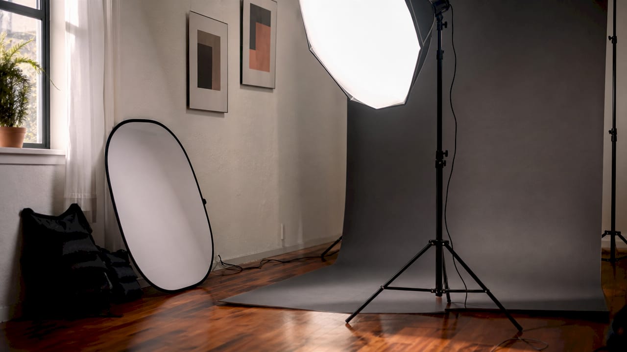 Photographic lighting equipment in minimal studio corner