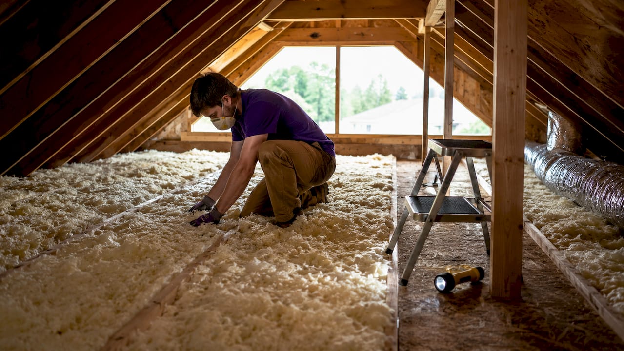 Visible joists and shallow attic insulation depth