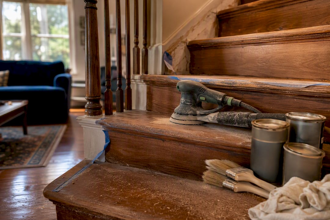 Refinishing tools on hardwood stairs