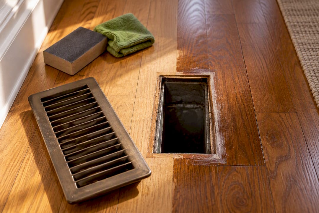 Uneven finish buildup around floor vent