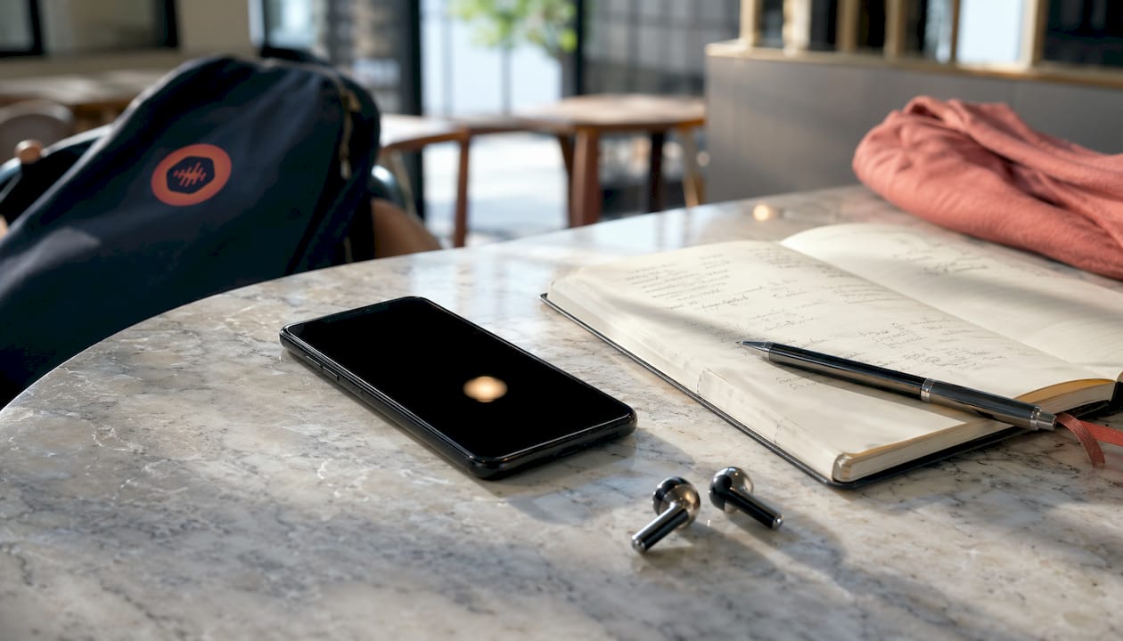 Smartphone with calibration notes on wood