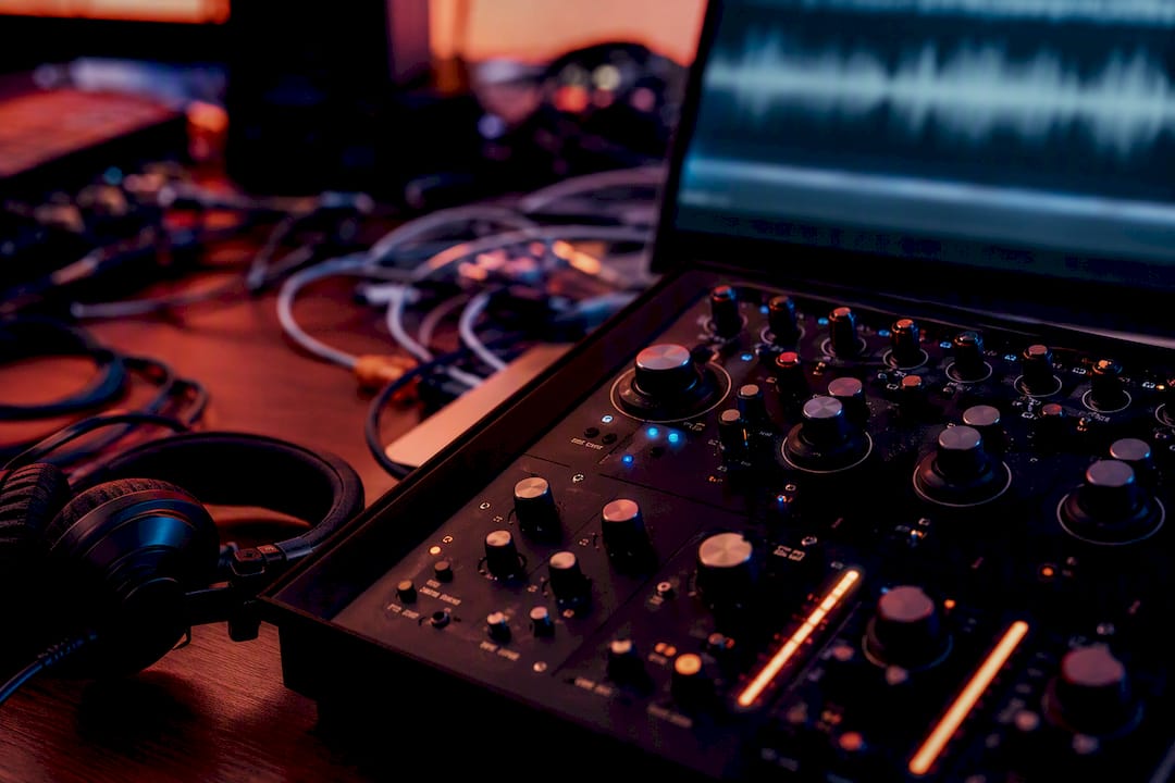 Audio workstation with converter dials and headphones
