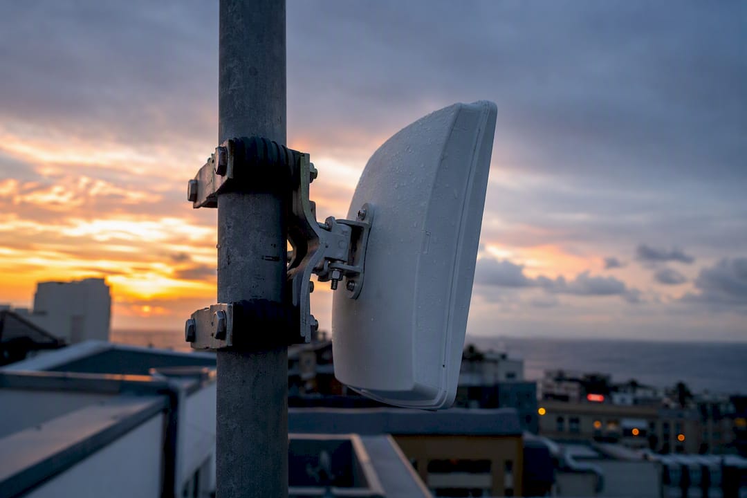 Wireless bridge antenna on rooftop pole