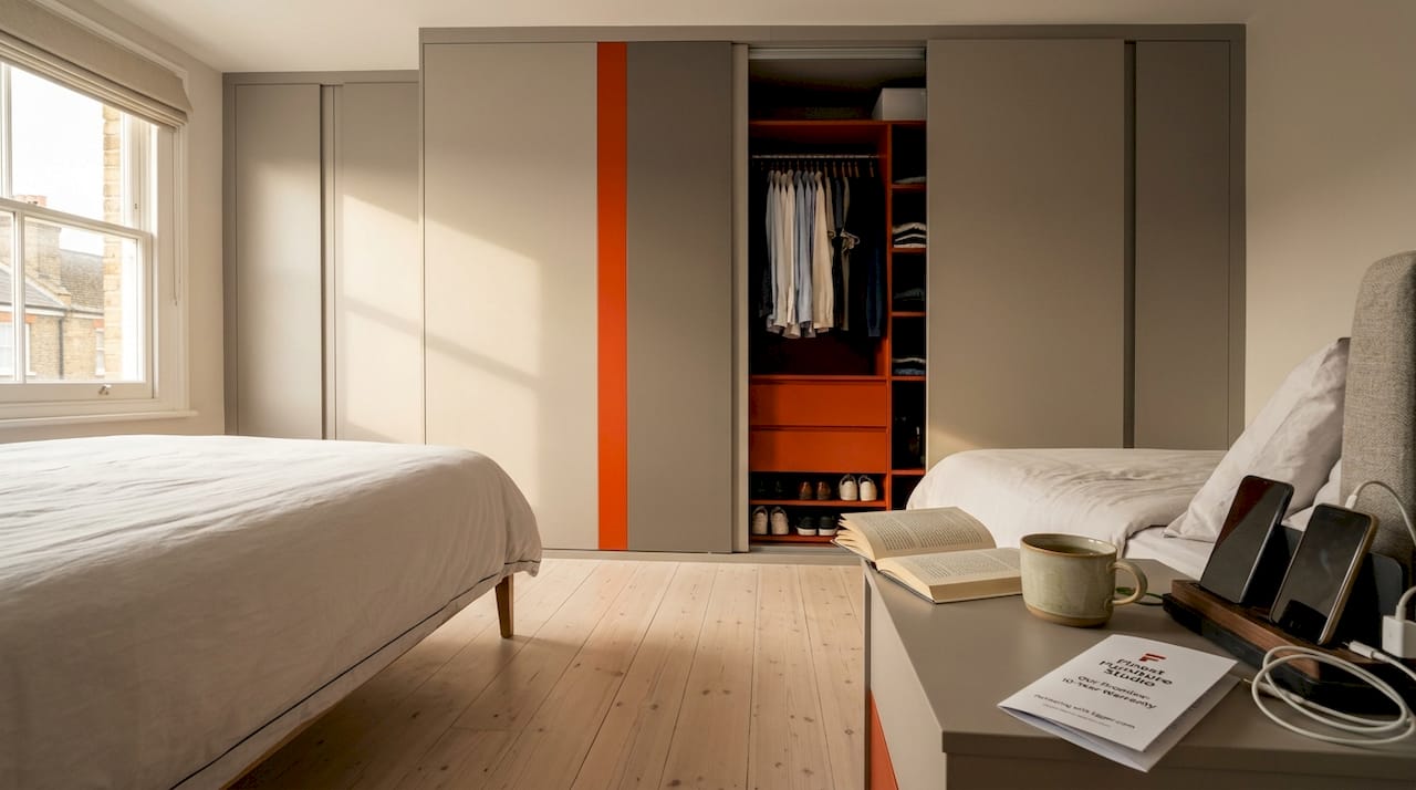 Fitted wardrobe in modern bedroom