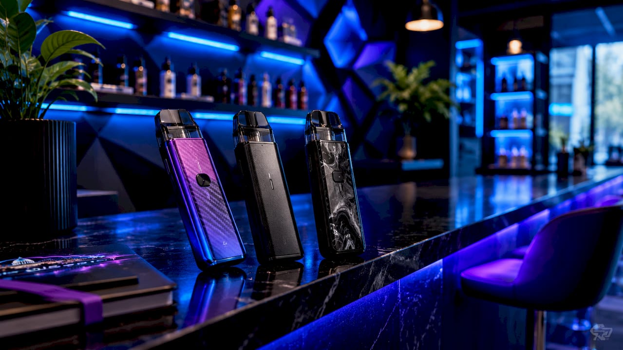 Three starter vape pod systems on white table