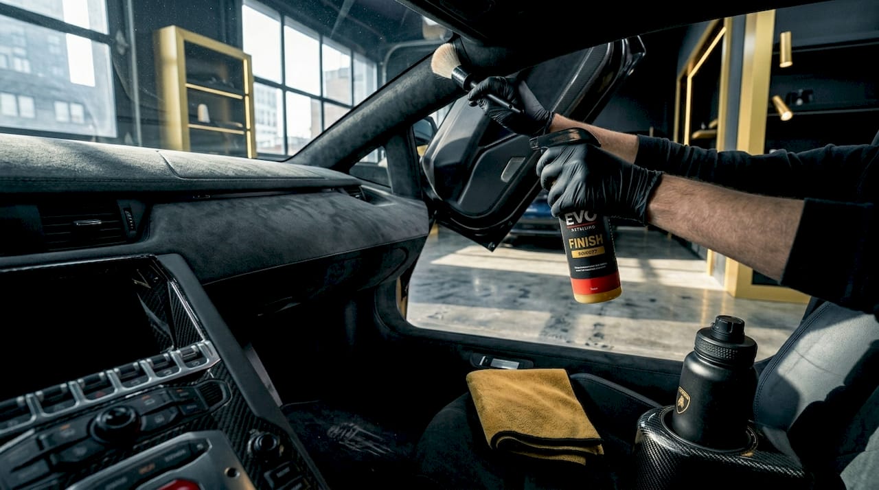 Careful cleaning inside Lamborghini car interior