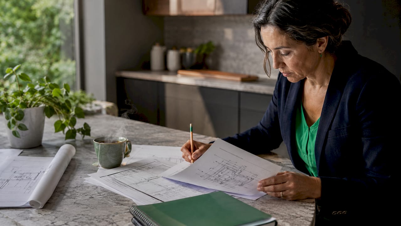 Architect reviewing accessibility standards document