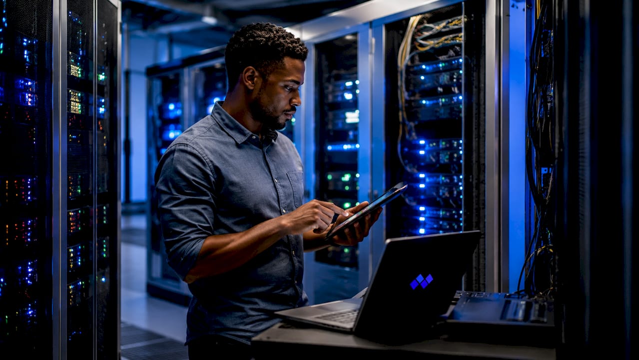 IT technician monitoring network telemetry data