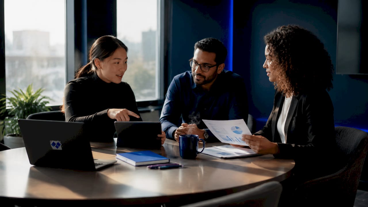 Diverse team collaborating around conference table