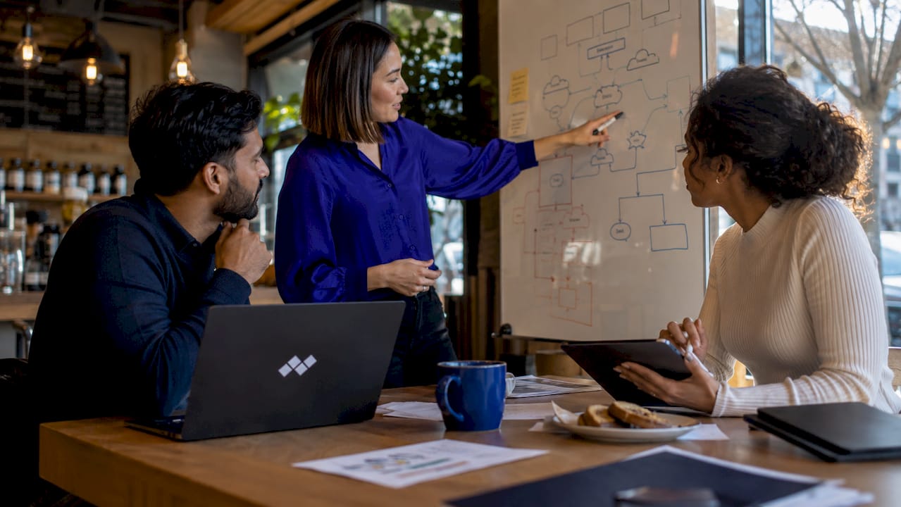 IT team collaborating on network data policies