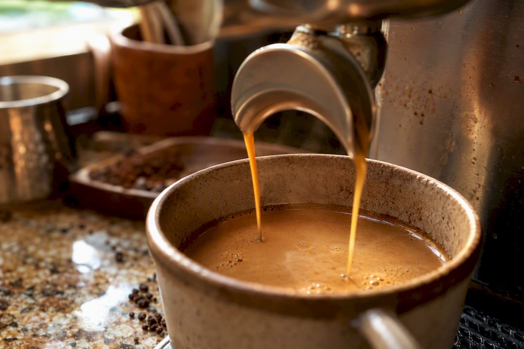 Close-up espresso shot with crema