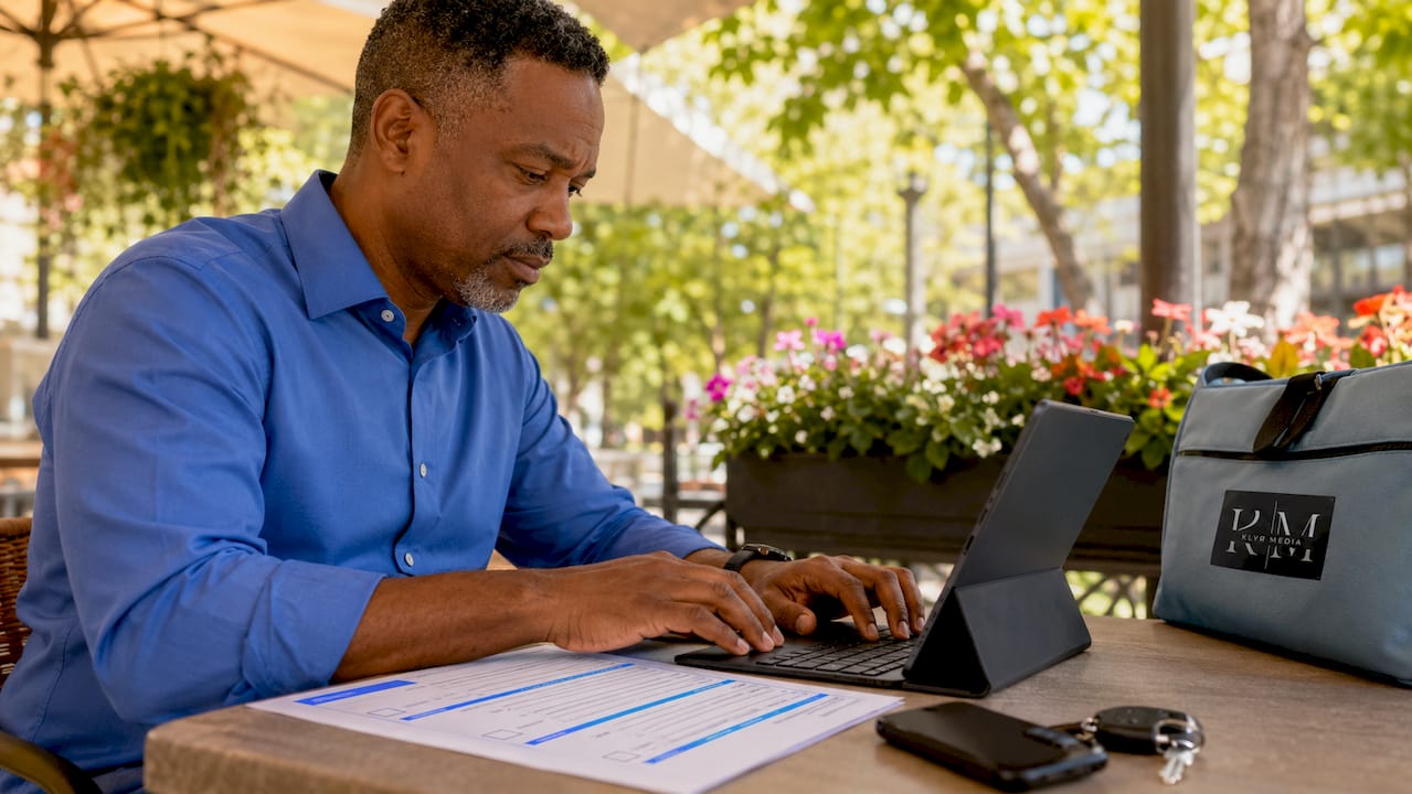 Close-up hands typing patient engagement checklist