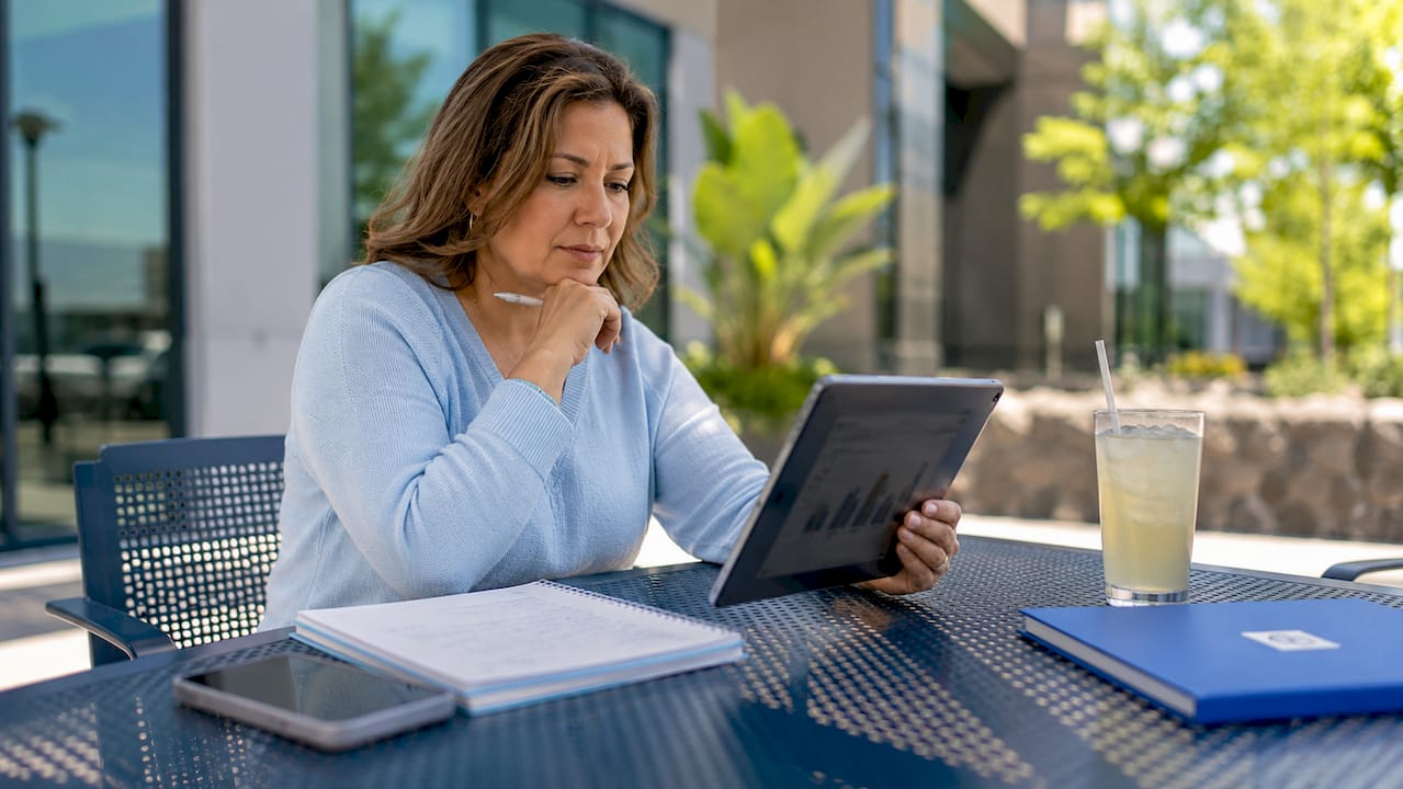 Marketing analyst reviewing clinic ad data