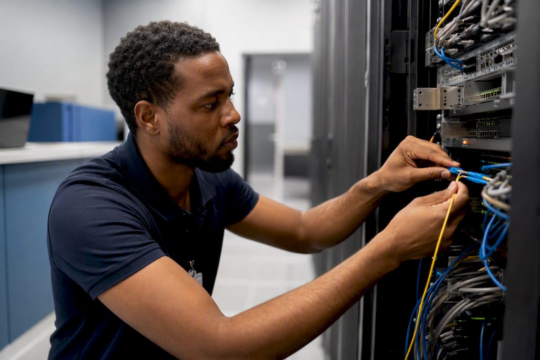 Technician connecting secure network cables