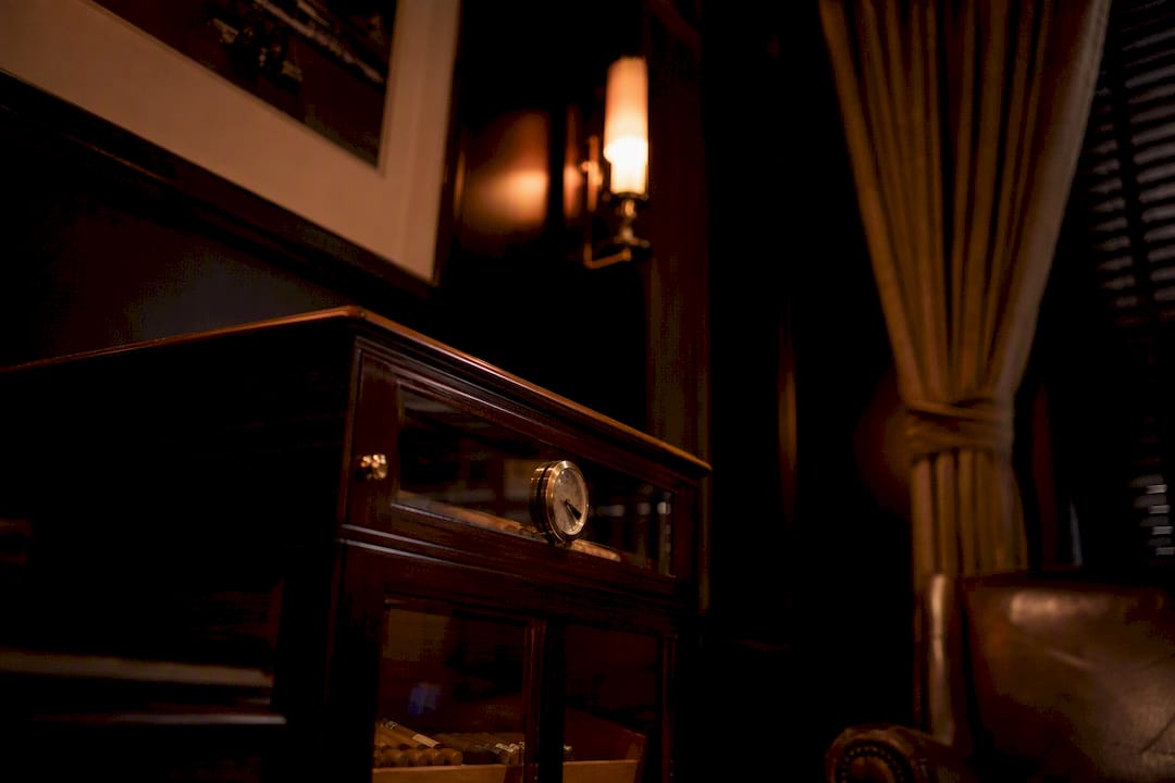 Warm LED layered lighting over cigar humidor