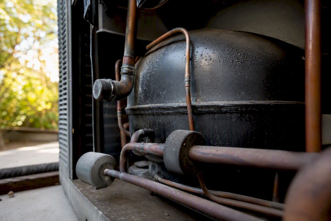 Close-up of AC compressor unit details