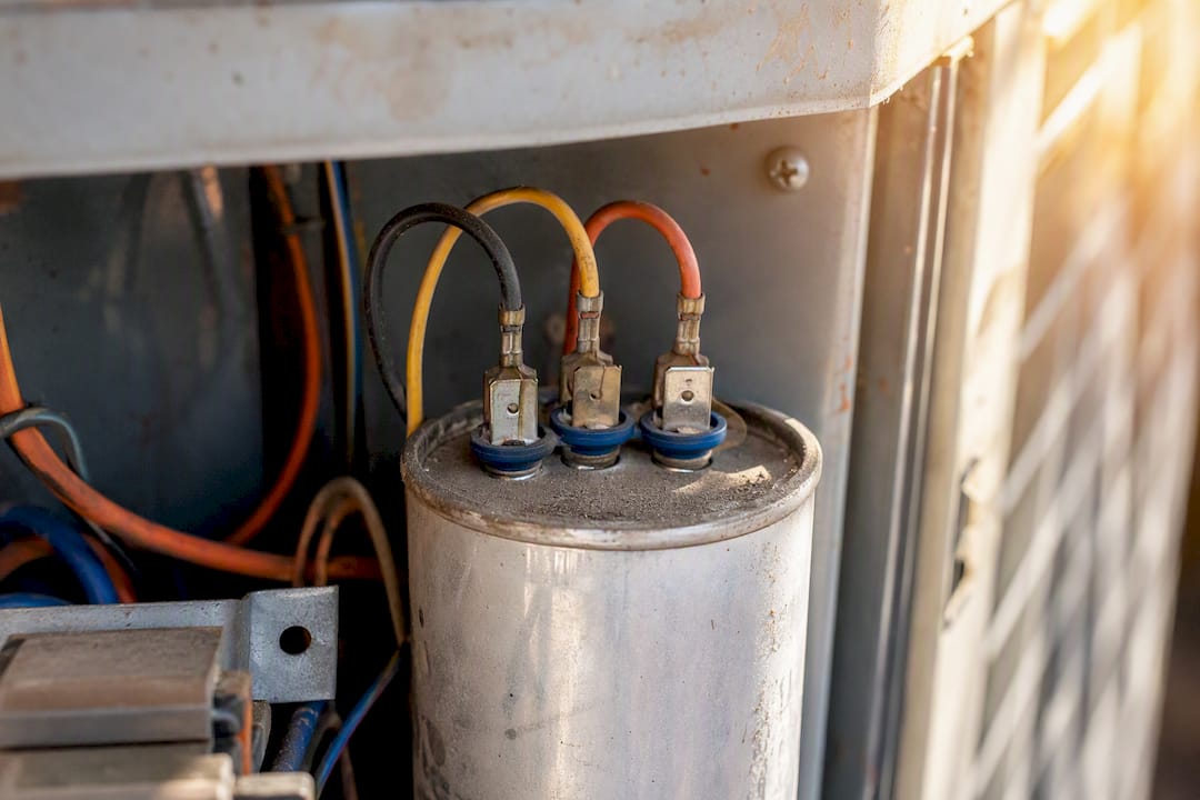 Dual run capacitor inside HVAC unit