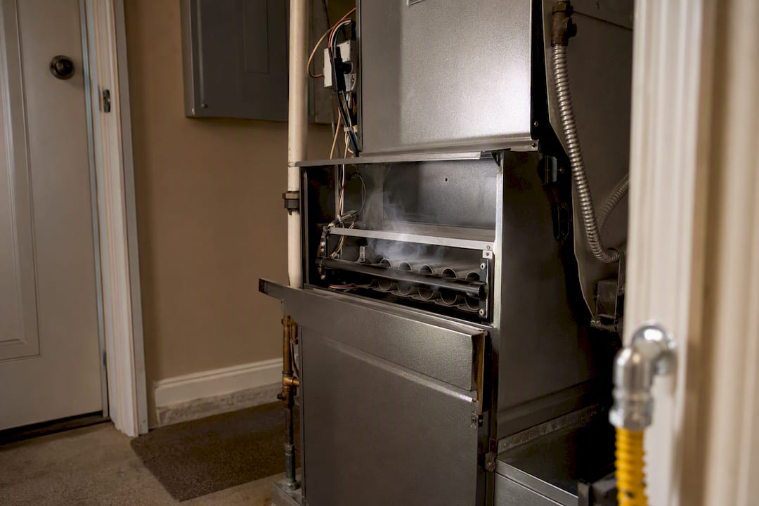 Close-up of gas furnace burner area
