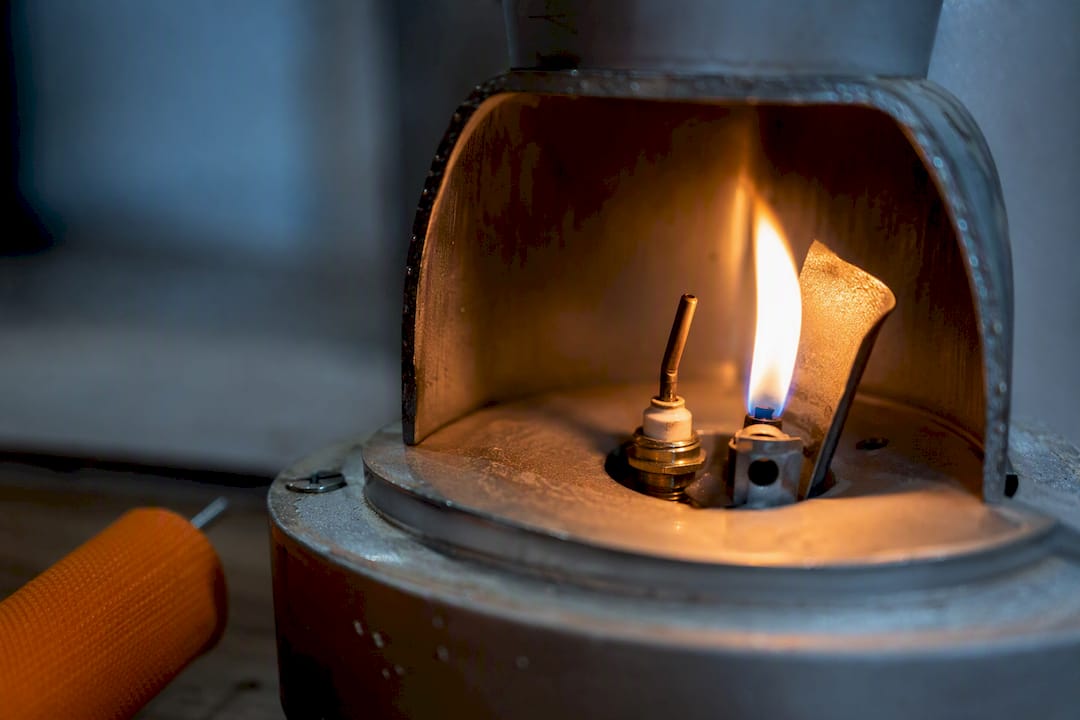 Pilot flame heating a thermocouple tip