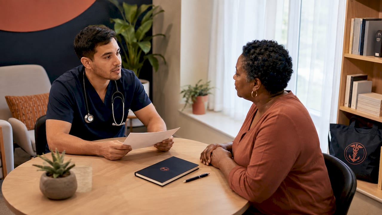 Provider reviewing health history with patient