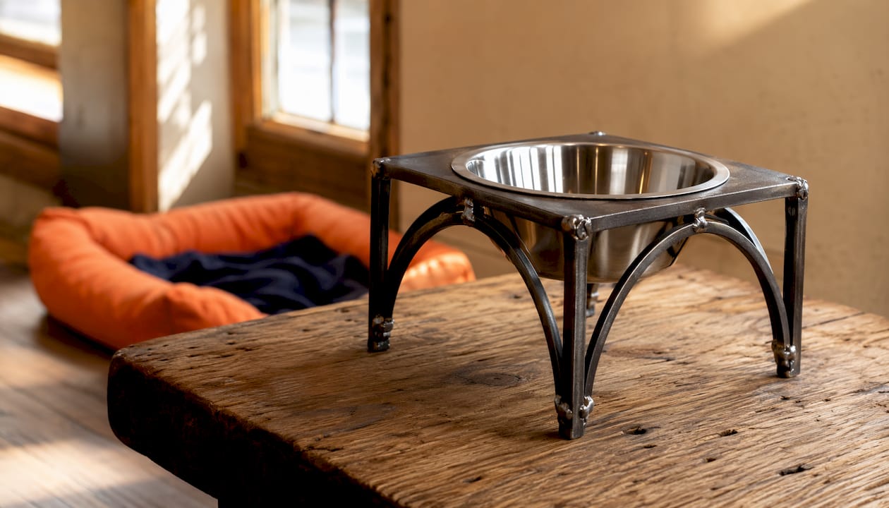 Line art of handcrafted metal dog bowl feeder