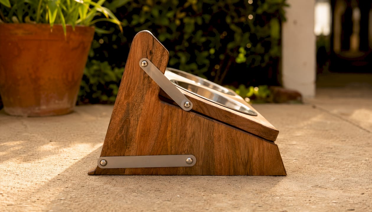 A-frame style anti-tip feeder side view on rustic table
