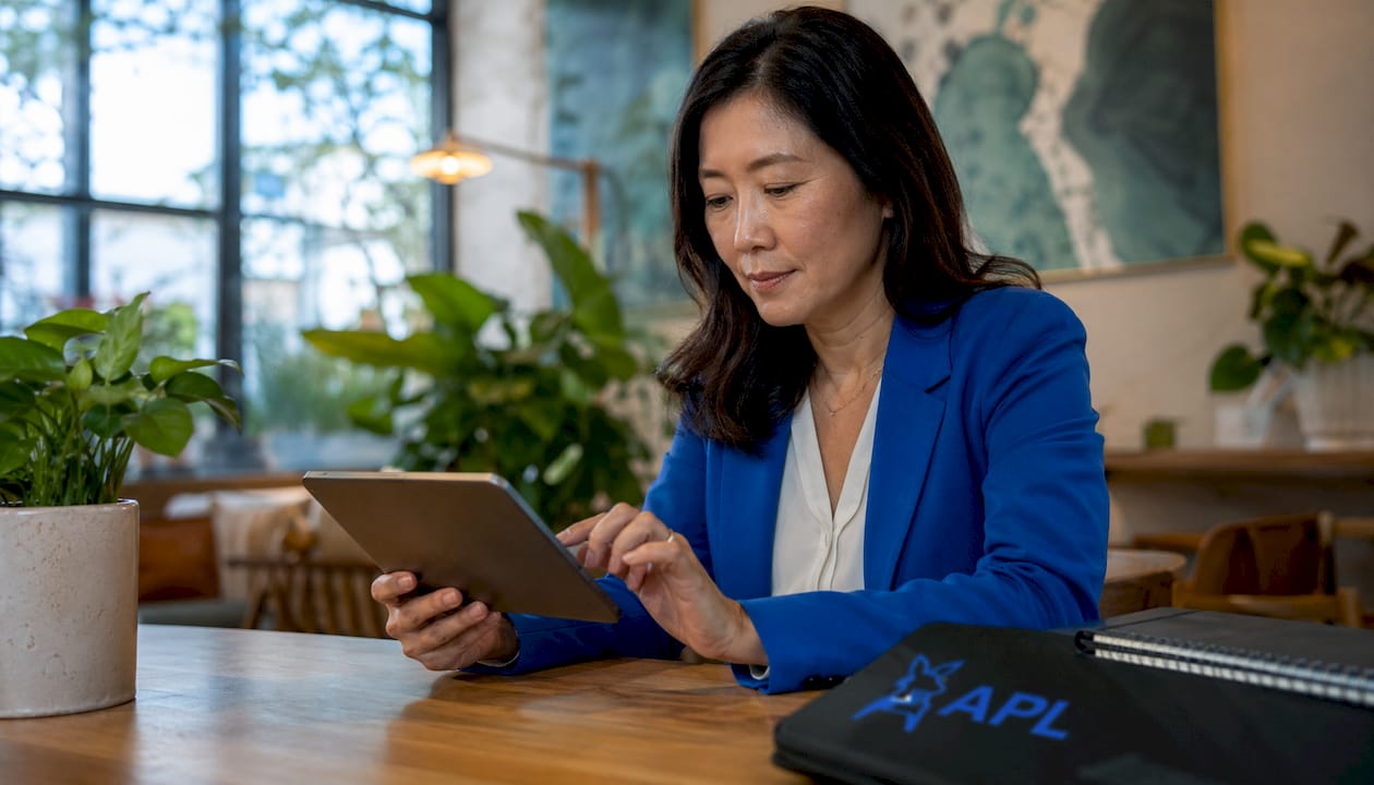 Researcher evaluating peptide supplier data on tablet