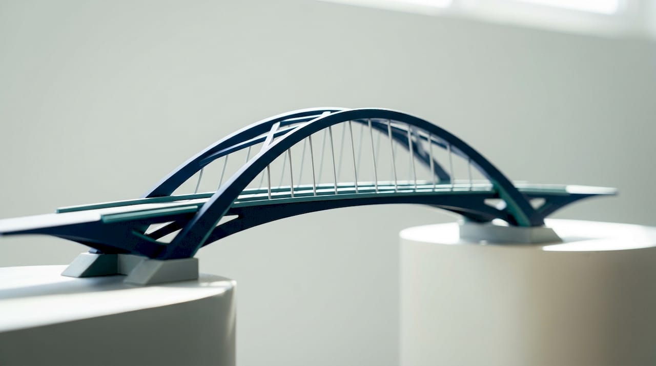 Close-up of modern bridge model symbolizing career transition