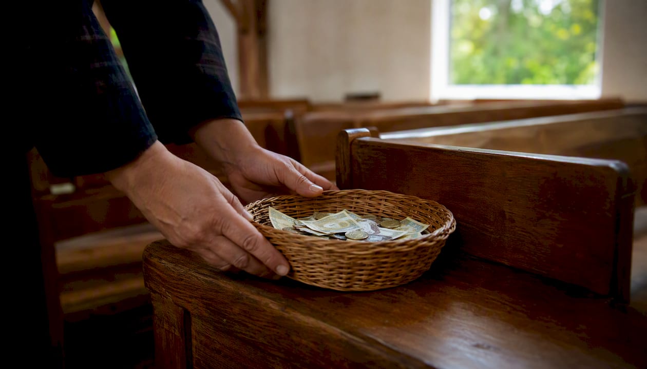 Woven offering basket filled with money